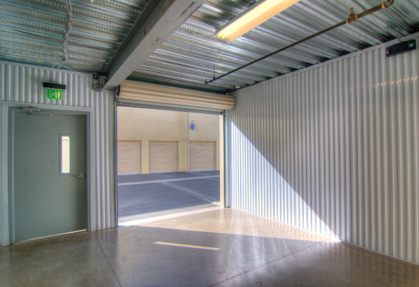 Large enclosed storage unit with roll-up door
