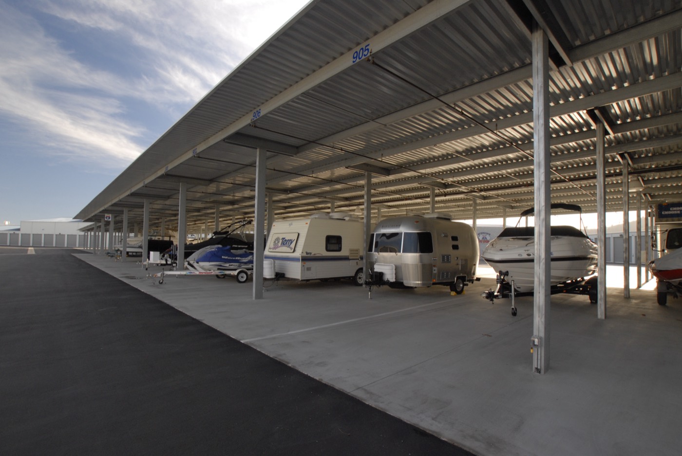 RVs, trailers and boats under the covered carport at Interstate Storage Richmond